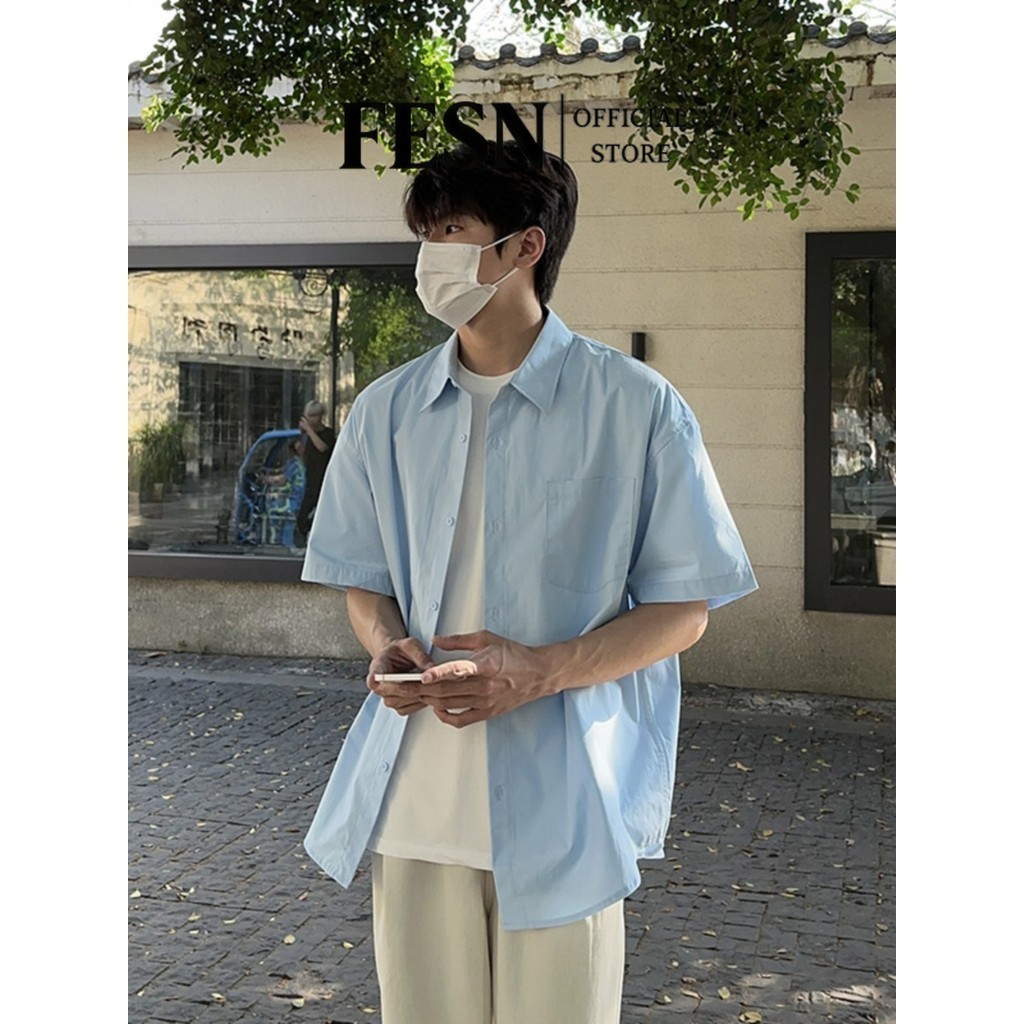 Twstudio เสื้อเชิ้ตแขนสั้นเรียบง่ายสีทึบสไตล์พื้นฐานหลวมสบายๆทุกการแข่งขันปกสีขาวชายฤดูร้อนเวอร์ชั่นเกาหลี