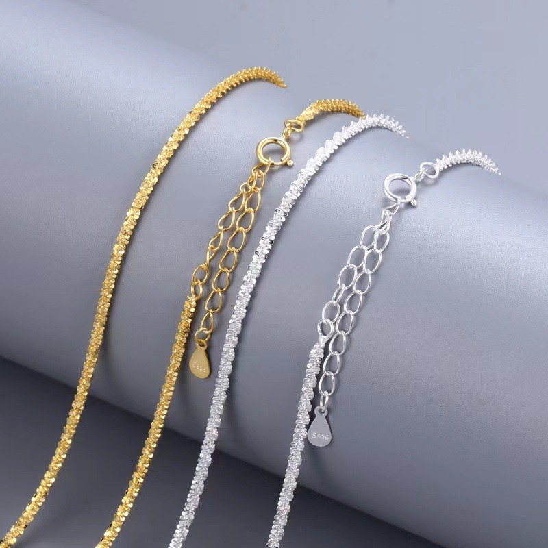 โซ่ทอง 18K สร้อยข้อมือเงินแท้ 925 กะหล่ําดอกโซ่ผู้หญิงประกายเกาหลีรุ่น starry sky สร้อยข้อมือสร้อยข้อมือแฟชั่นเรียบง่ายขายส่ง