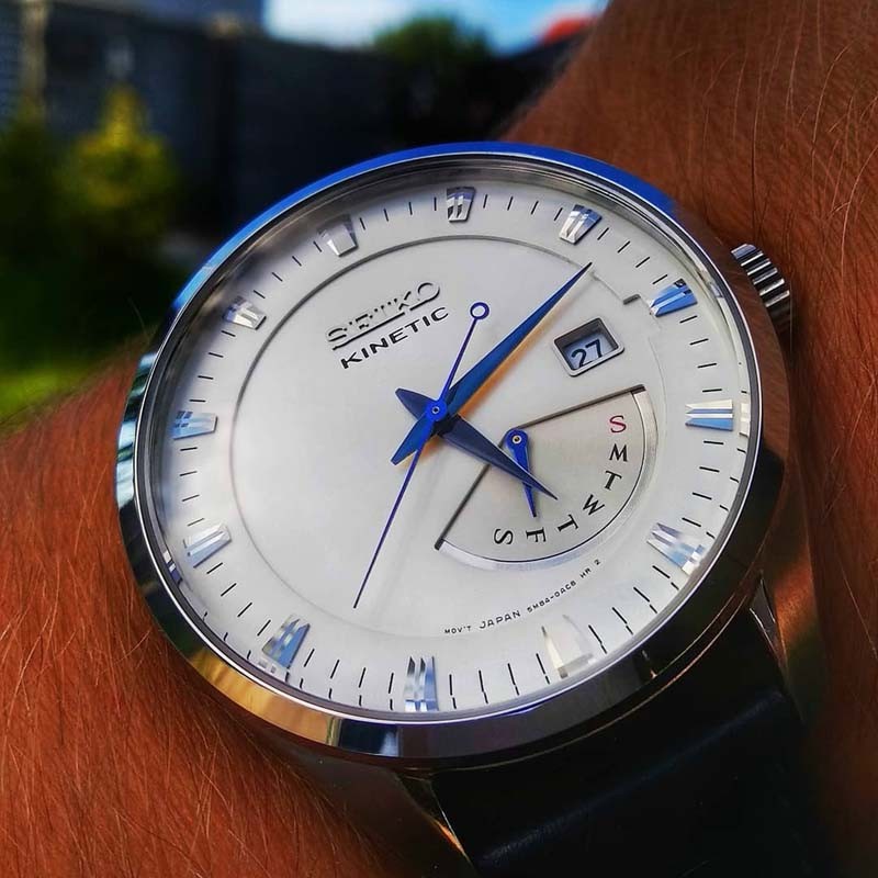 Daigou Seiko Seiko นาฬิกาชายขนาดเล็กเข็มสีฟ้า Kinetic ประดิษฐ์ Kinetic กลับโปร่งใสนาฬิกาผู้ชาย SRN07