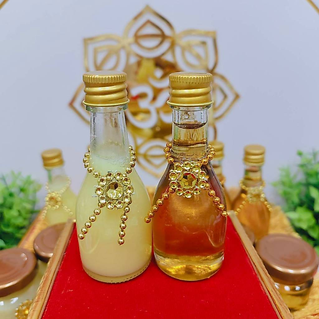 เนยกีย์แท้ น้ำผึ้งแท้ ขวดยาวสร้อยเพชรทอง ขนาด 30 ml ถวายพระพิฆเนศ
