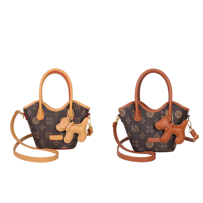 กระเป๋าสะพายข้างทรงถังสำหรับผู้หญิง ดีไซน์ใหม่ พิมพ์ลายหรู ความจุขนาดใหญ่ สินค้าคุณภาพสูง