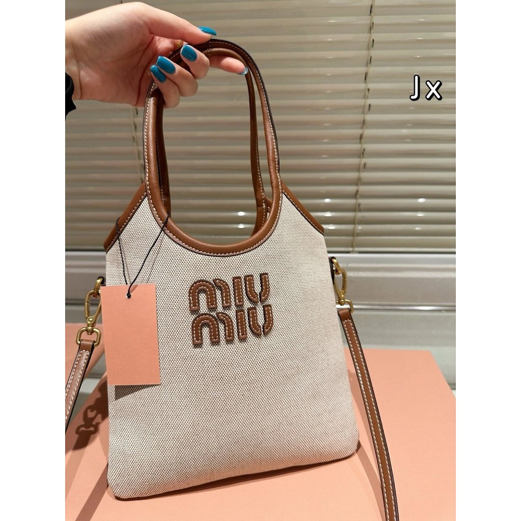 Miumiu Miumiu Canvas tote Bag CXYU
