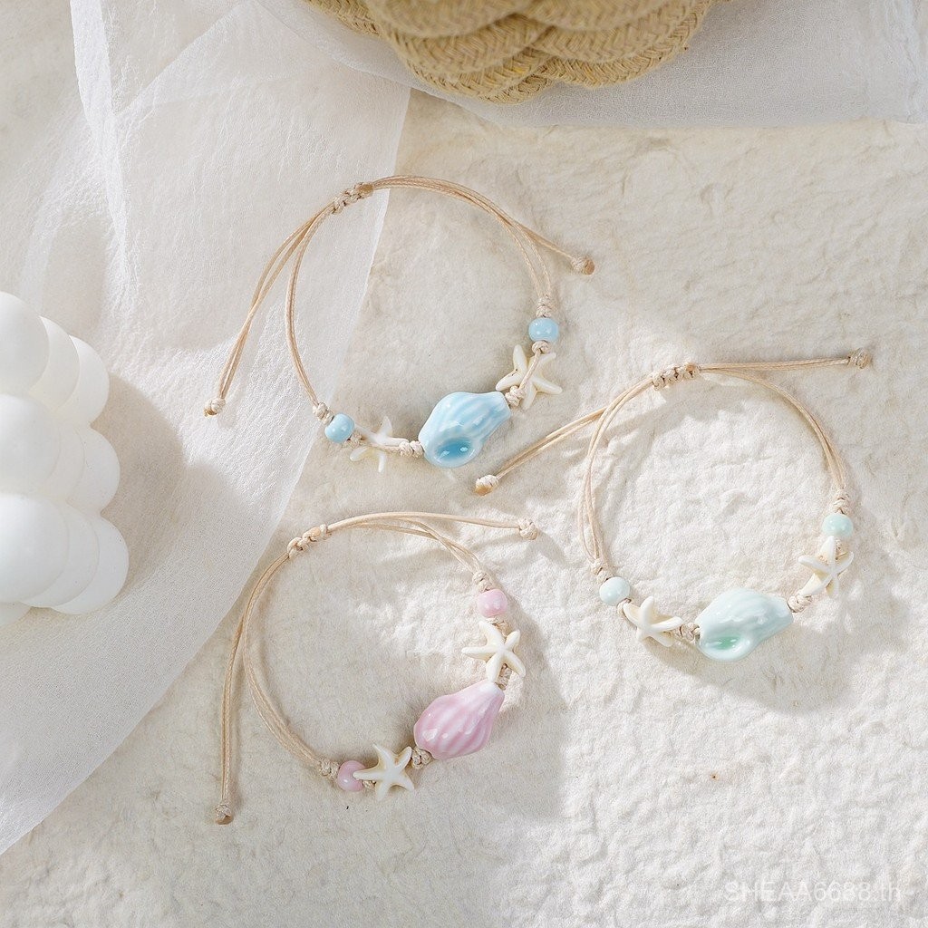 แหล่งกําเนิดสร้อยข้อมือเซรามิกถักการออกแบบเฉพาะระดับไฮเอนด์หญิงหวานทุกการแข่งขันวรรณกรรมสร้อยข้อมือเ