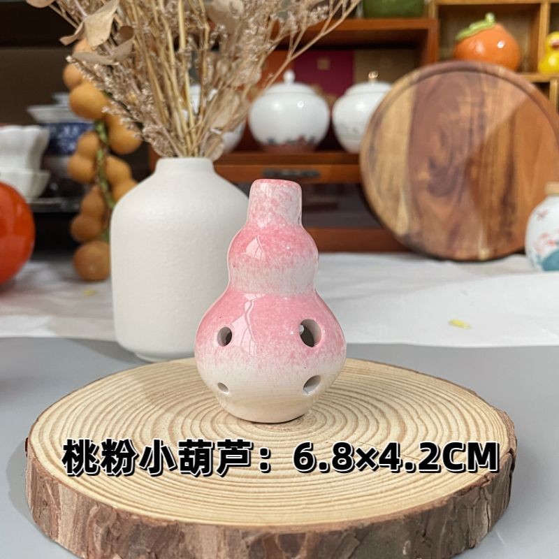 การ์ตูน Ocarina หกหลุมเครื่องดนตรีเด็ก Alto C Key เริ่มต้นเครื่องปั้นดินเผา Xun Lanyard Score AC Key