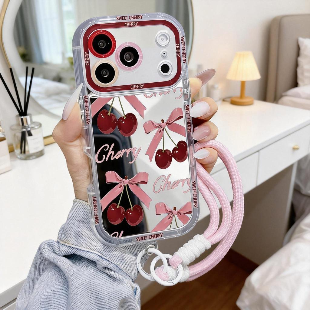 เคสไอโฟนกระจกมองหน้า ป้องกันเลนส์ ลายเชอร์รี่โบว์ชมพู น่ารัก มีขาตั้ง แถมสายคล้อง สำหรับ iPhone11131518/17ProMaxJHJMNYK9