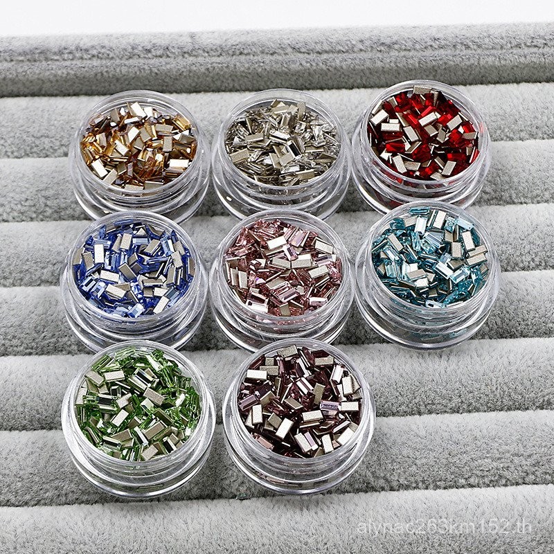 Dongzhou คริสตัลแถบยาวแต่งเล็บเพชร Huazi ตัด K9 คริสตัล Strobe Edge ด้านล่างแบนเพชรสี Candy อุปกรณ์แ