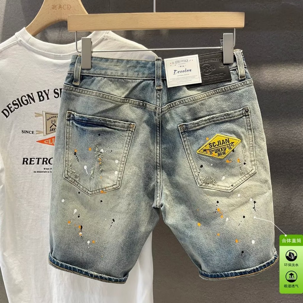 Light Blue Splash Ink Denim กางเกงขาสั้นผู้ชาย ดีไซน์สตรีทสไตล์ สำหรับคนชอบแฟชันและมองหาความโดดเด่น