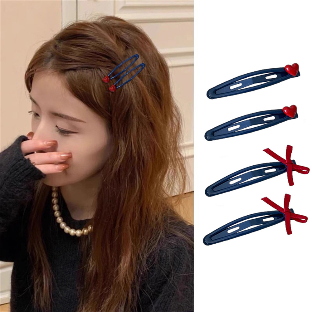 กิ๊บติดผมสีแดงสำหรับผู้หญิง ออกแบบมาเพื่อใช้งานที่หน้าผากและด้านข้าง มาพร้อมคลิปเรียบที่ให้ความสะดวกในการใช้งาน