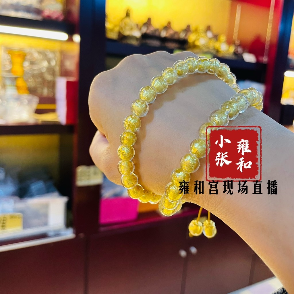 ปักกิ่ง Yonghe Palace Circulation Place ฟอยล์สีทองหอมเคลือบสีเทา Ruyi ลูกปัด 54 สร้อยข้อมือสร้อยข้อม