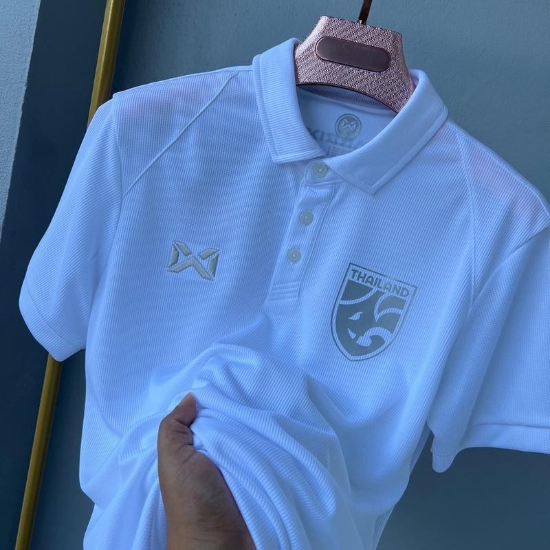 เสื้อโปโล Warrixcl-34 ขอบเขียว