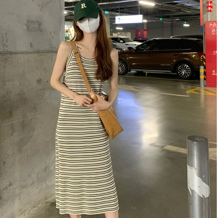 สไตล์ขี้เกียจลายถักสลิงชุดผู้หญิงสไตล์ใหม่ฤดูใบไม้ผลิเวอร์ชั่นเกาหลีหลวมสวมใส่ด้านนอกรอบคอตรงกระโปรง