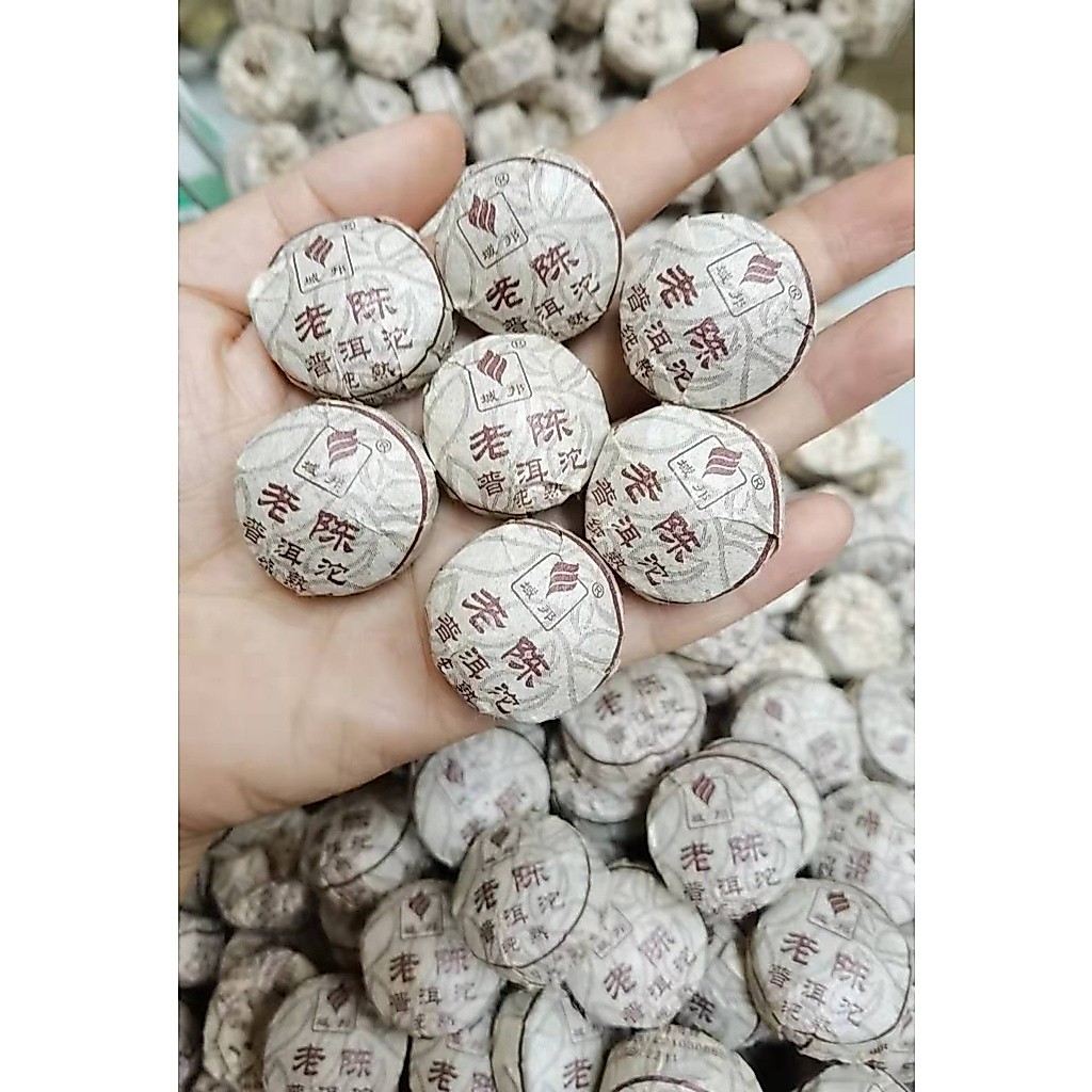 ชาผู่เอ๋อกลิ่นธรรมชาติเก่ามากมีอายุ 20 ปี （老陈普洱粒P10）ชาหอมมากอร่อยชุ่มคอ