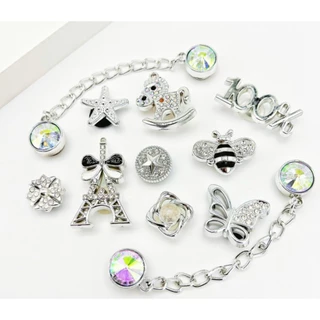 เครื่องประดับรองเท้า.Cross Jibbilz Charms สำหรับรองเท้าชายหาด ลายดอกไม้และผีเสื้อพร้อมชุดกระเป๋าแบบแมว