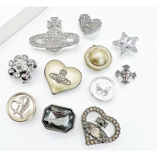 เครื่องประดับรองเท้า.Cross Jibbilz Charms สำหรับรองเท้าชายหาด ลายดอกไม้และผีเสื้อพร้อมชุดกระเป๋าแบบแมว
