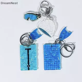 [DreamNest] 1 ชิ้นหมวกว่ายน้ําแหวนกุญแจรถสร้างสรรค์สระว่ายน้ําหยักพวงกุญแจตกแต่งกระเป๋าจี้ Swimmers ของขวัญ (th)