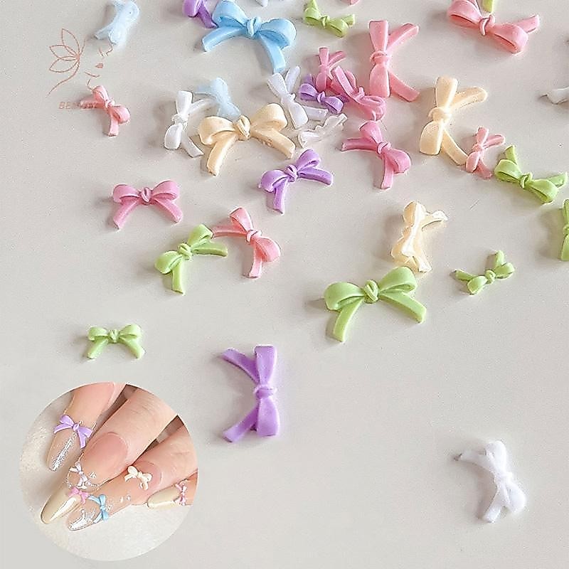 [maybeauty] 50 ชิ้นที่มีสีสันโบว์เล็บชิ้นส่วน Charms จํานวนมากเงาเรซิ่นริบบิ้นเล็บ Rhinestones DIY ฤดูร้อนอุปกรณ์ตกแต่งเล็บ {TH}