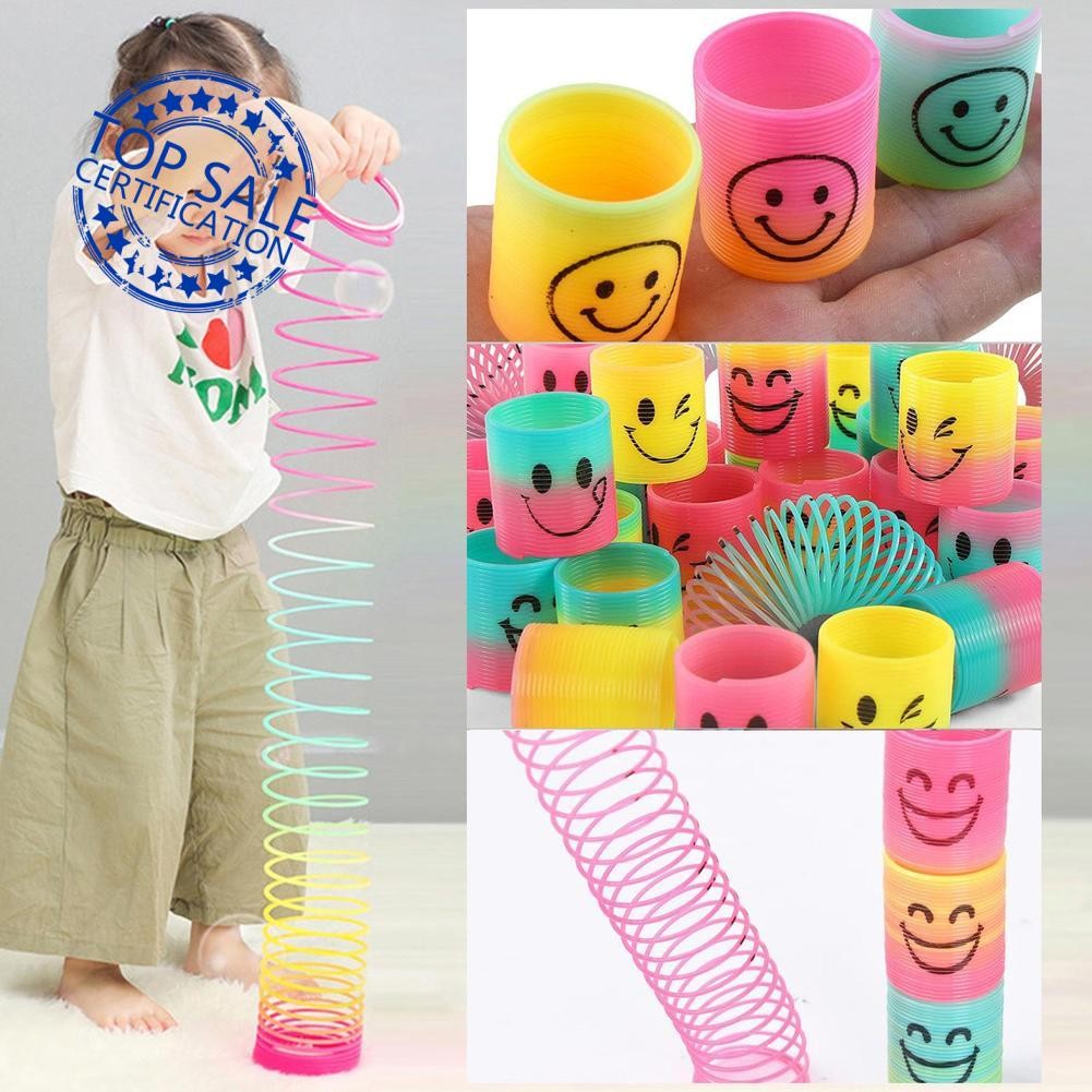 Rainbow Spring Toy Circle Smiley Magic Circle และ Party Stretch Girls Gift Boys T5w0