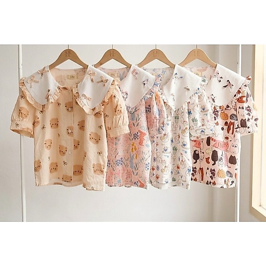 ป้าย Lilly เสื้อผ้าพิมพ์ลายปกบัวระบายต่อชั้น อก 42 นิ้ว ยาว 21 นิ้ว
