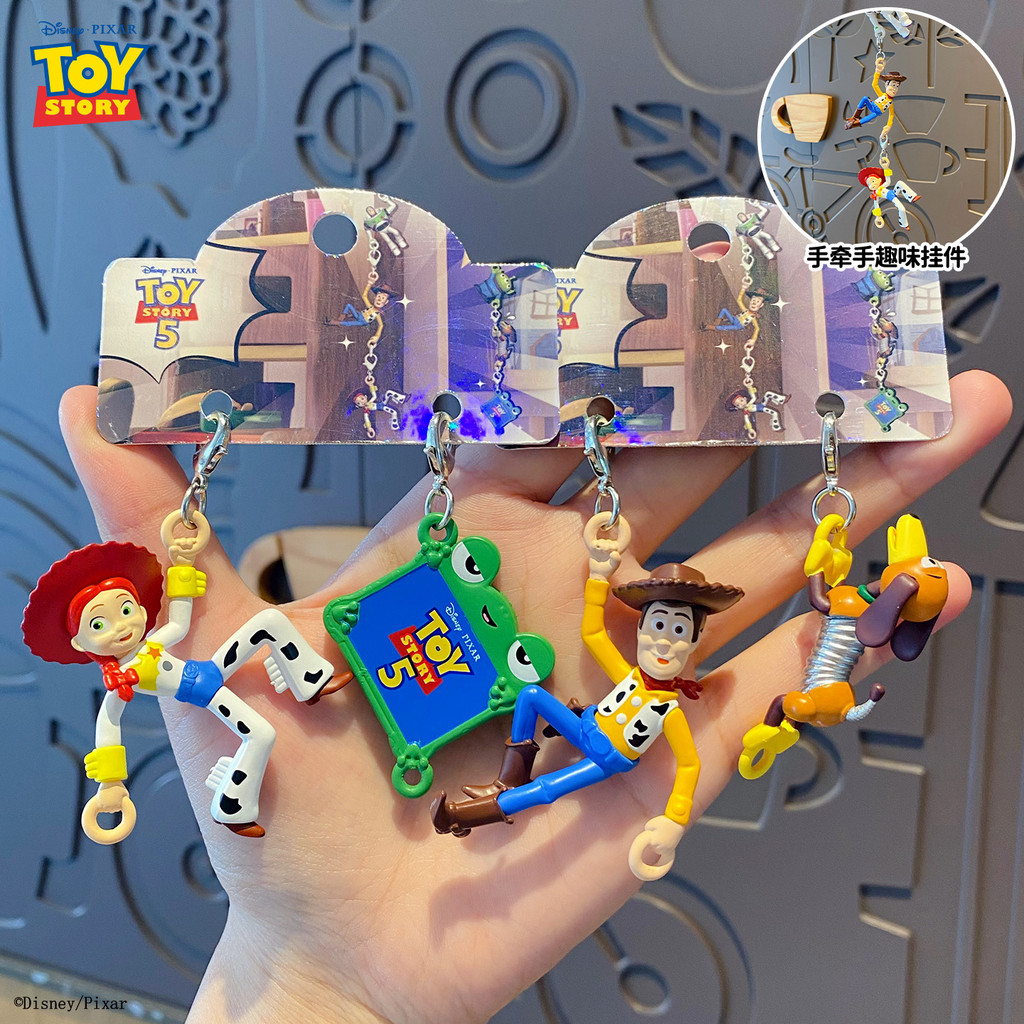 Toy Story Climbing Charm พวงกุญแจจี้การ์ตูนสร้างสรรค์ Woody ตุ๊กตากระเป๋านักเรียนจี้หัวเข็มขัด