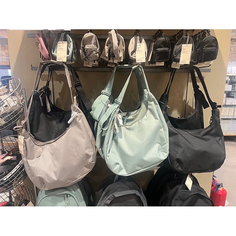 Muji 2WAY กระเป๋าสะพายไนลอนกันน้ํากระเป๋าสะพายข้างหญิงกระเป๋าเดินทางความจุขนาดใหญ่กระเป๋าพกพากระเป๋า