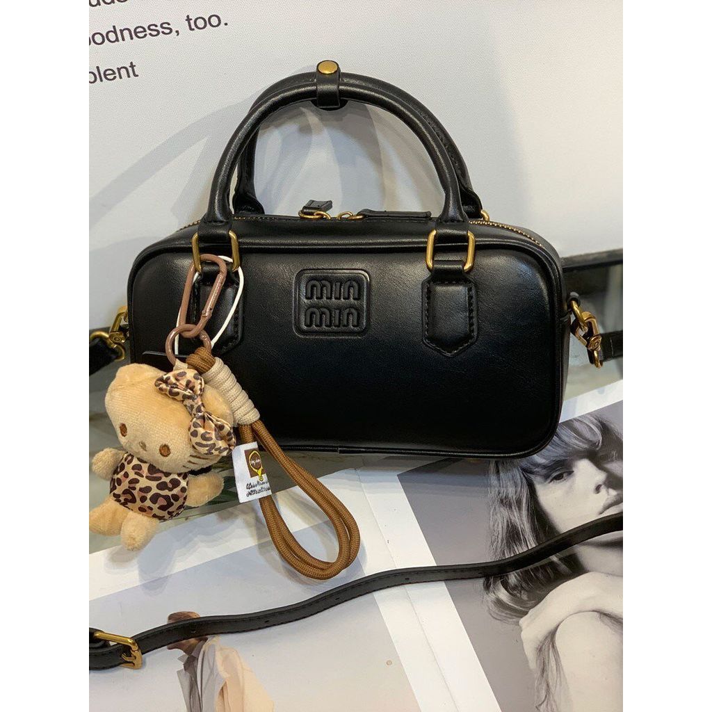 กระเป๋าหญิงใหม่ MinMin Fashion Retro Cowhide Letter Mini Pillow Portable One-Shoulder Messenger Smal