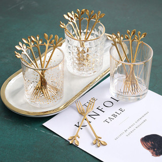 ช้อนส้อมสแตนเลส สีทอง ตักขนมหวาน คนเครื่องดื่ม ด้ามปลายลายใบ…