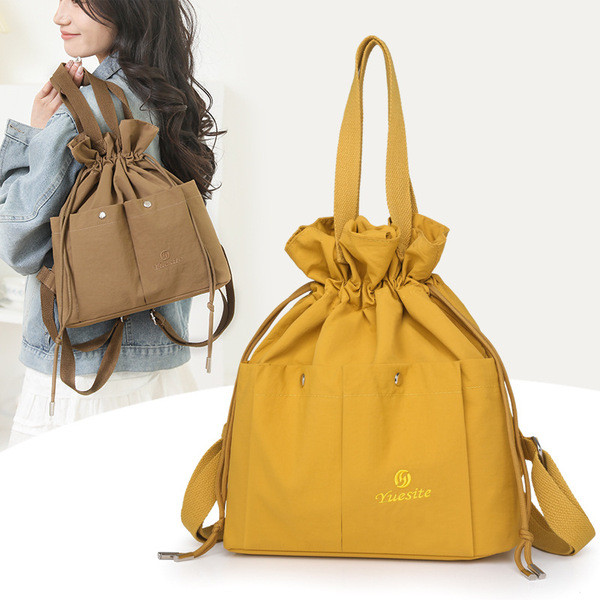 kappa bkk กระเป๋าปัก กระเป๋าสะพายเชือกรูดสไตล์เกาหลีสไตล์โมริแบบใหม่ปี2025กระเป๋าเป้สะพายหลังแบบผ้าไ