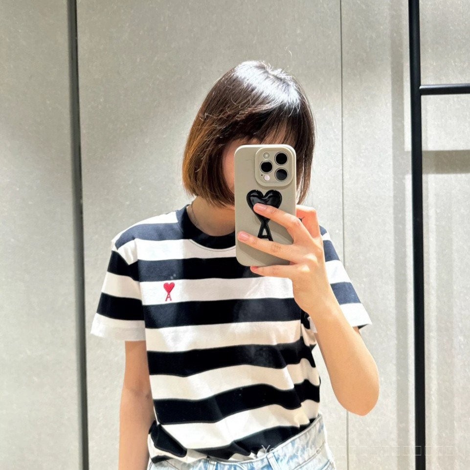 new ami ความรัก  Paris เสื้อยืดแขนสั้นสำหรับผู้ชายและผู้หญิง ลายปักหัวใจแบบบางๆ ออกแบบคอปก สไตล์เรีย