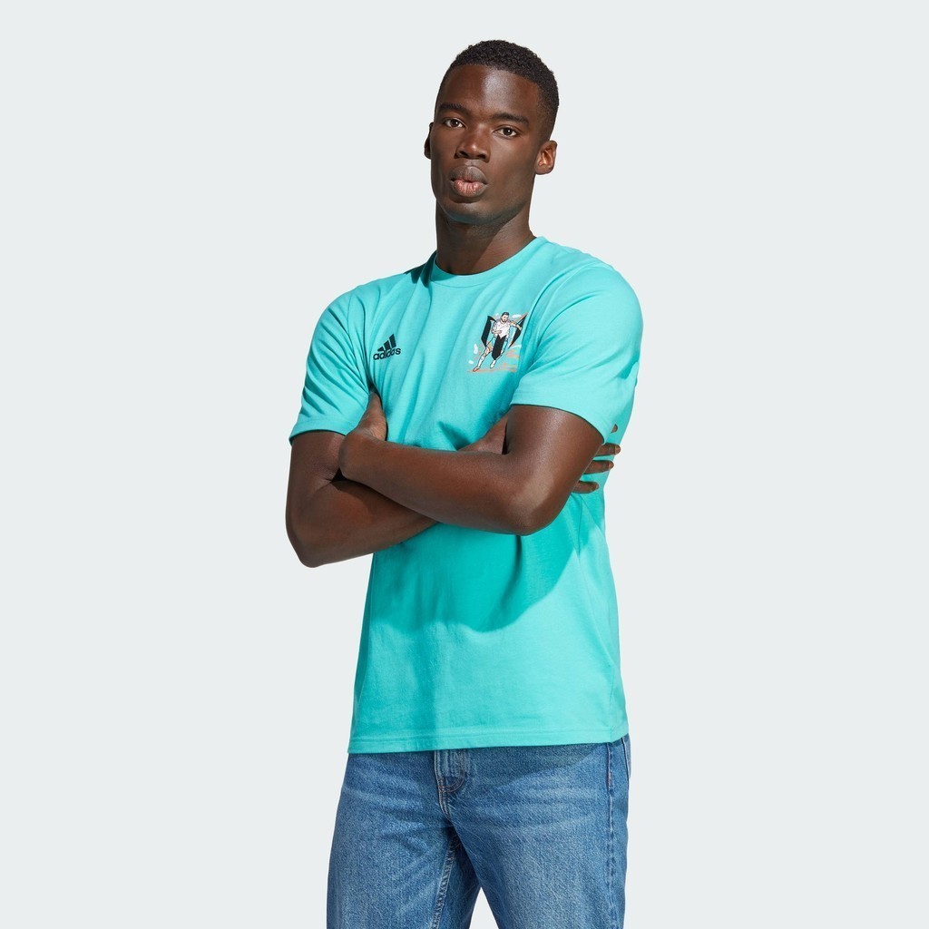 adidas ฟุตบอล เสื้อยืดพิมพ์ลาย Messi Football Icon ผู้ชาย สีเทอร์คอยส์ HY8704