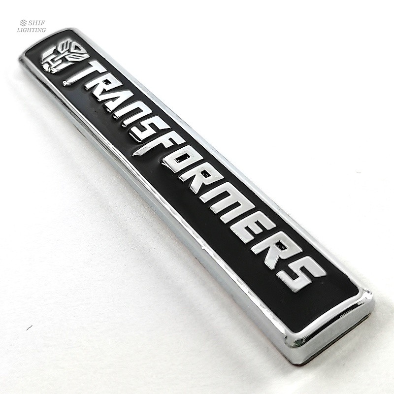 1 x ใหม่ TF TRANSFORMERS ตกแต่งด้านข้าง Fender Emblem สติกเกอร์หม้อแปลงไฟฟ้า Autobots