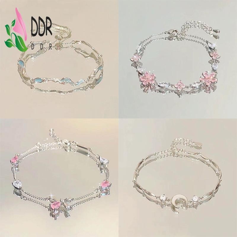 สร้อยข้อมือโบว์เชอร์รี่เพทายสีชมพูกับดาวและดวงจันทร์ สำหรับผู้หญิง