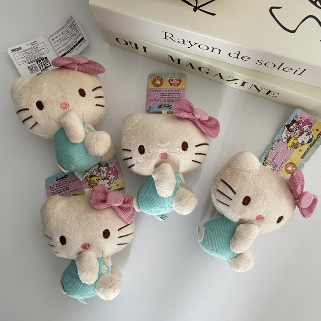 ตุ๊กตาHELLO KITTYน่ารัก แบบนั่งด้านข้างพร้อมกระเป๋าจี้