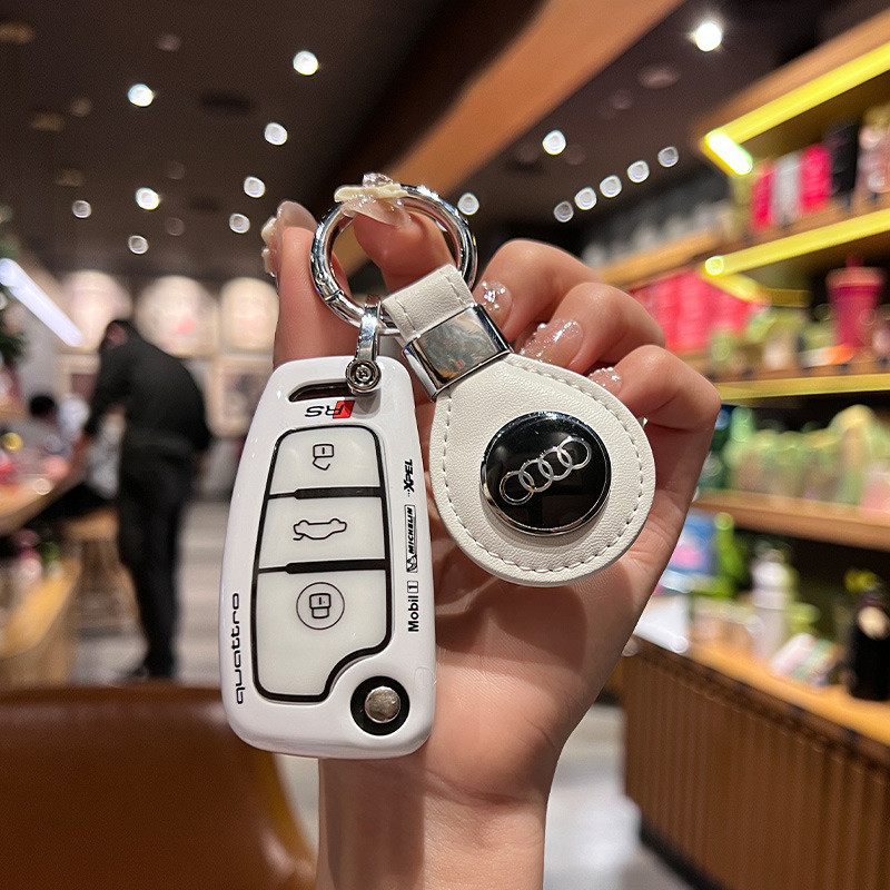 เฉพาะ 06 07 08 09 Audi q3 ฝาครอบกุญแจ q2l/Q7 ชาย 20 a3 เก่า A6 กระเป๋ารถพับได้หัวเข็มขัด Shell Track