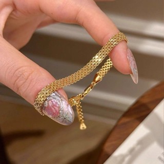 สร้อยข้อมือเหล็กไทเทเนียมสายทอง ส่องประกายหรู เหมาะสำหรับสไต…