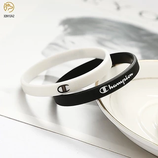 Champion สร้อยข้อมือยาง สร้อยข้อมือคู่ กำไลข้อมือซิลิโคน สไตล์กีฬา สีดำและสีขาว ลายตัวอักษร สำหรับผู้ชายและผู้หญิง