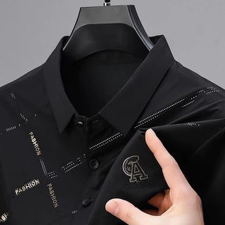 PROMAN เสื้อโปโลผู้ชายคอปกสั้น ผ้าไอซ์ซิลซ์ ลายพิมพ์ สไตล์เกาหลี ทรงหลวมเรียบง่าย ใส่ประจำวัน เหมาะพ่อ