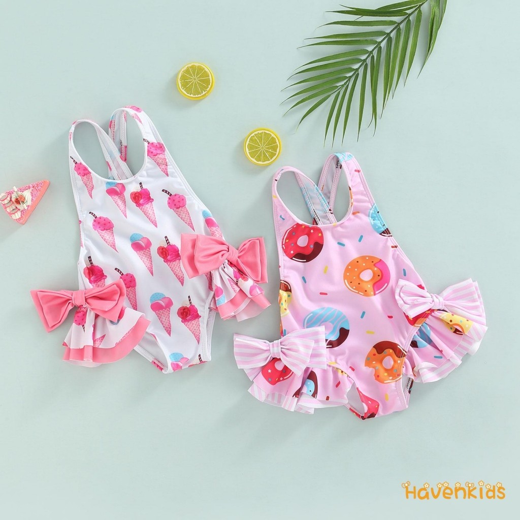 HaK-Kids ชุดว่ายน้ําแขนกุดสำหรับเด็กหญิง อายุ 1-6 ปี พิมพ์ดoughnutและไอศกรีมขนาดใหญ่ มัดbowsและpleats
