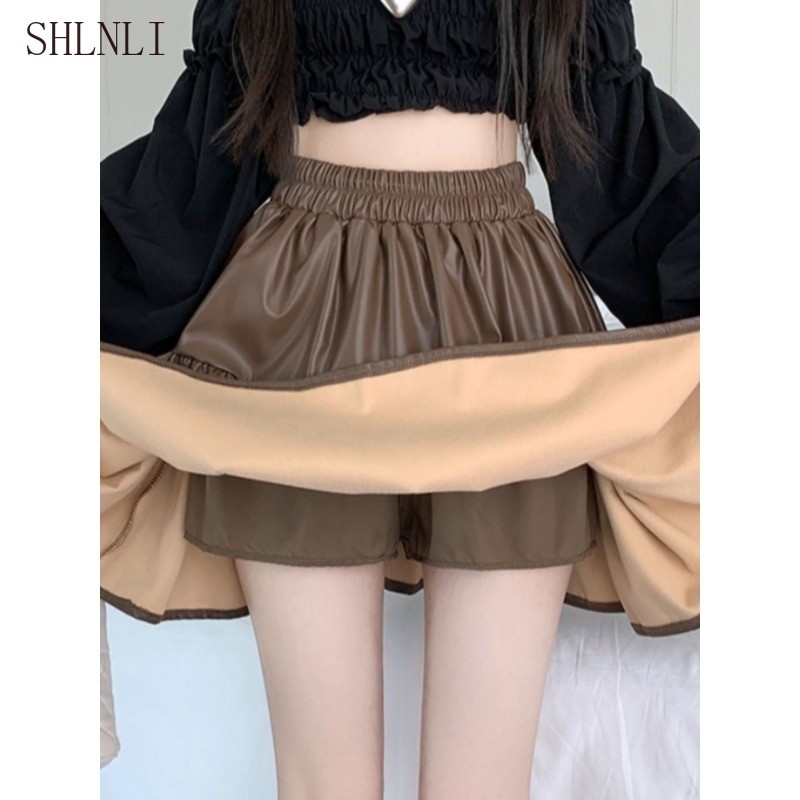 เอียวนุ่มยืดสีกาแฟสำหรับผู้หญิง กระโปรงสั้นPUหนังทรงA-line พรางงานปัก สำหรับฤดูหนาวและใบไม้ร่วง - รูปที่ 2