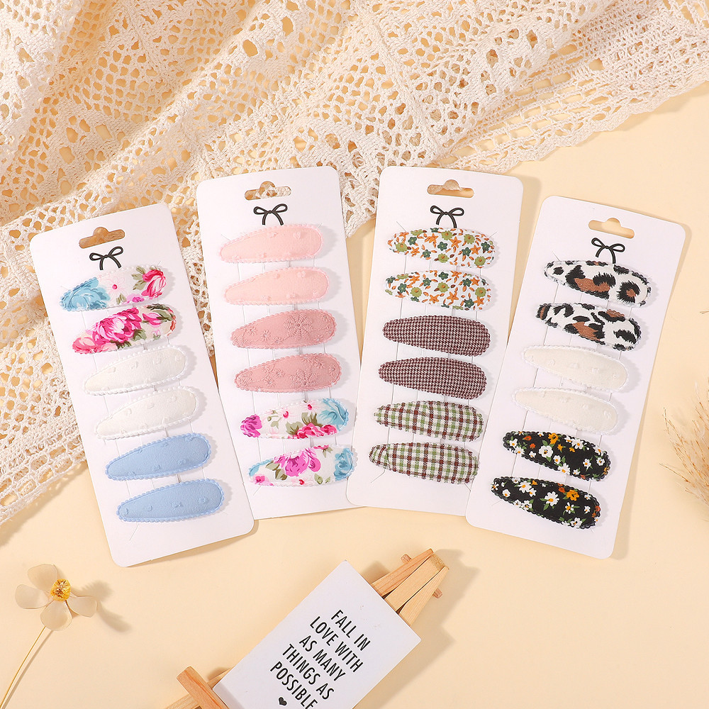 6ชิ้น/เซ็ตหวานพิมพ์BBกิ๊บสําหรับเด็กทารกนุ่มแฮนด์เมดดอกไม้คลิปผมปิ่นปักผม ชม. หูฟัง อุปกรณ์ผมขายส่ง