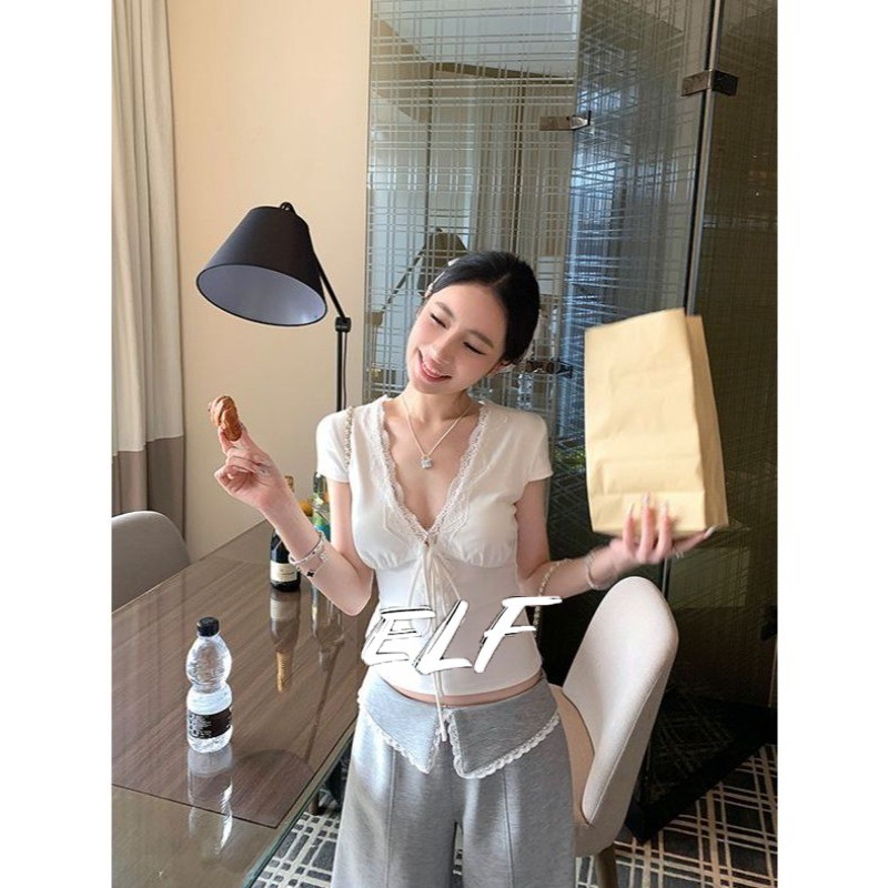 เสื้อท็อปโบว์ลูกไม้แขนสั้นจาก텐เซล สไตล์summer chic