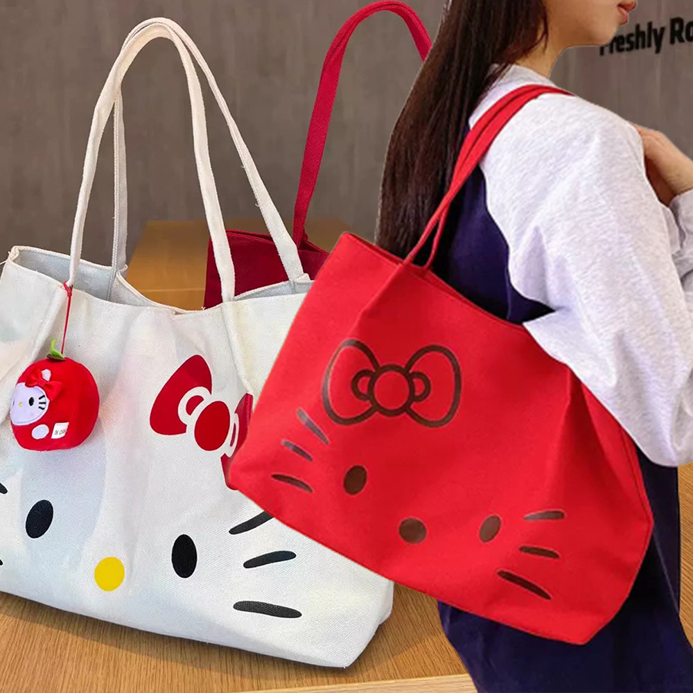 กระเป๋าโท้ต Hello Kitty พิมพ์ลายบนผ้าแคนวาส ขนาดใหญ่ สวมใส่งานวันหยุดและทำความสะอาดได้ง่าย