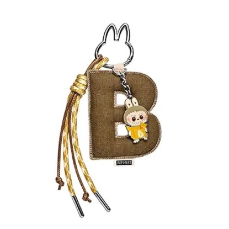 POP MART Labubu THE MONSTERS พินLETTER B ของแท้