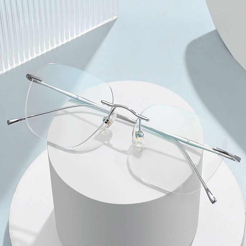 Ultra-light Titanium แฟชั่น Anti-blue Light กรอบแว่นตาผู้ชายผู้หญิง Rimless แว่นตา 632