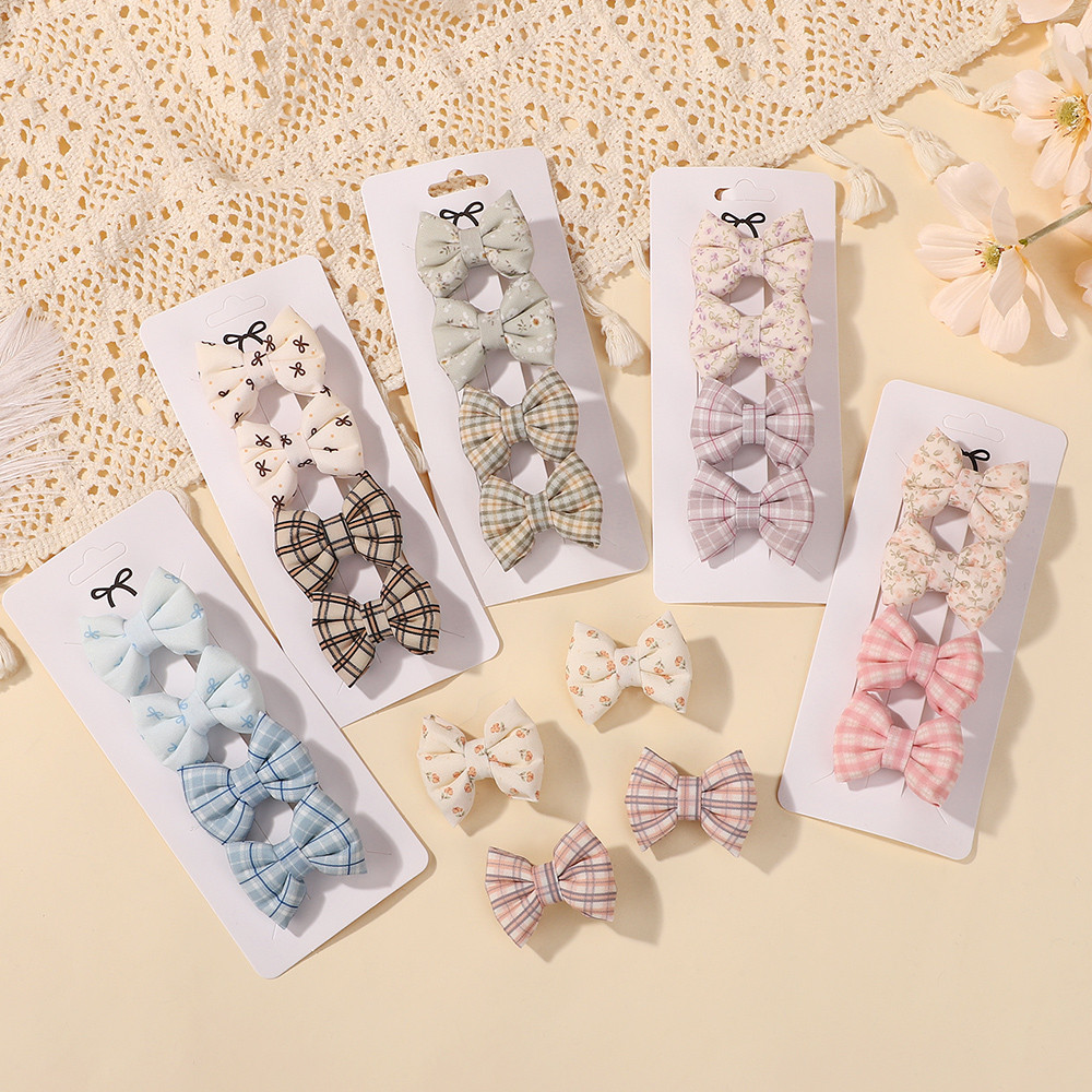 คลิปผมและปิ่นผมลายดอกไม้น่ารัก พร้อมโบว์สำหรับเด็กสาว 4 ชิ้น-set