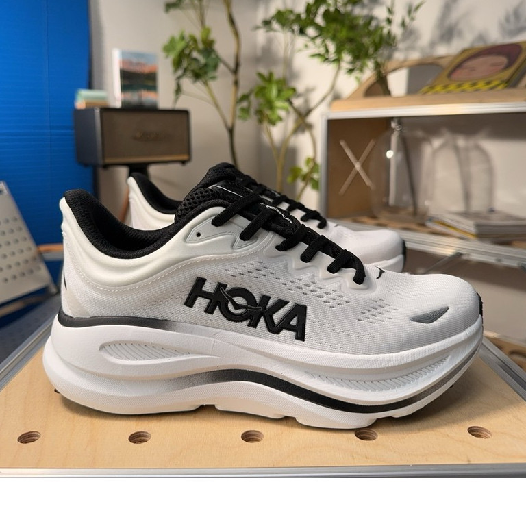 X1TY HOKA Bondi 9 City รองเท้าวิ่งสำหรับผู้ชายและผู้หญิง สไตล์ casual ออกแบบมาให้มีฟังก์ชันลดแรงกระแทก น้ำหนักเบาและระบายอากาศได้ดี มีพื้นยางหนา
