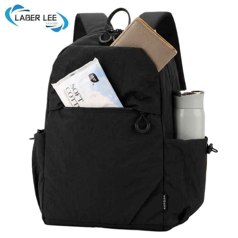 LABER LEE กระเป๋าเป้สะพายหลังลําลองสําหรับผู้หญิงผู้ชายน้ําหนักเบากันน้ํา Daypack กระเป๋าป้องกันการโจรกรรมหลายกระเป๋าแล็ปท็อปกระเป๋าเป้สะพายหลังเหมาะกับ 15 นิ้วเดินทางมีสไตล์ Rucksack สําหรับงานโรงเรียน
