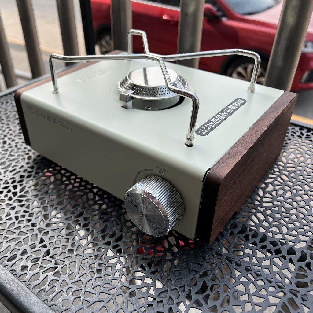 เกาหลี KOVEA CUBE เตาเทปคาสเซ็ตนําเข้าในครัวเรือนแบบบูรณาการแก๊สบาร์บีคิวมินิกลางแจ้งแบบพกพา Iwatani