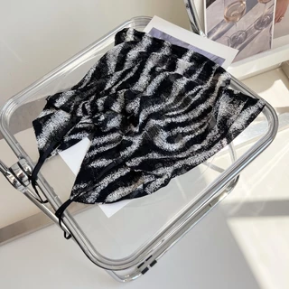 77UNI Tank 7034 Zebra-stripe suspender เสื้อสายเดี่ยวลายม้าลายสีดำผ้าซีทรู ช่วงอกผ้า2ชั้น