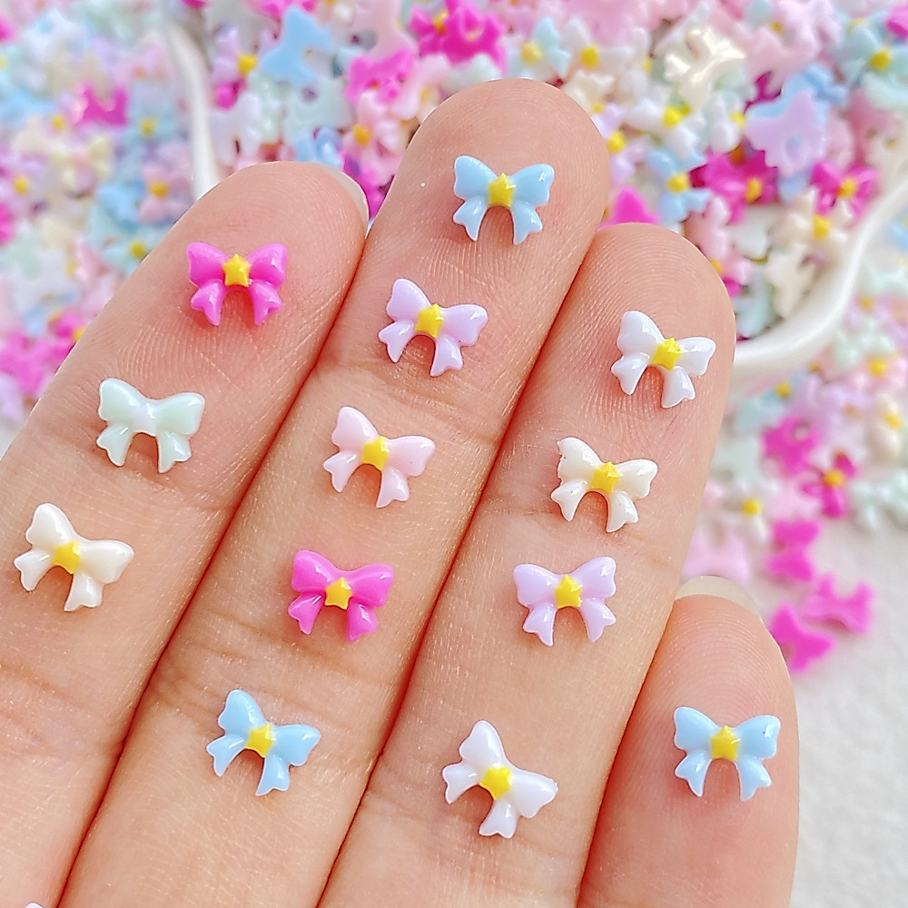 100ชิ้นของผสมเล็บเรซิ่นมินิสีดาวโบว์ตกแต่งเล็บทําเองหัตถกรรมตกแต่งเล็บ3ง เครื่องประดับ