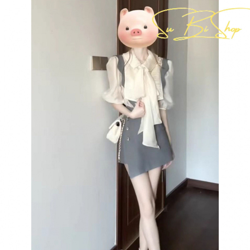 {Subi-Oder}Xiaoqi ชุดเสื้อแขนพัฟเกาหลีสําหรับผู้หญิงออกแบบเฉพาะกระโปรงสั้นสายรัดอสมมาตร